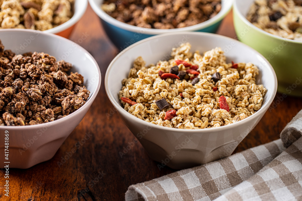 Various breakfast cereals. Morning granola in bowl. Various breakfast cereals. Morning granola in bowl.