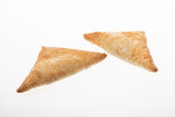 Crispy chicken patties triangle shape on white plate