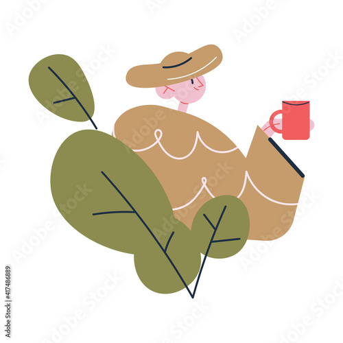 Smiling man traveler tourist standing with cup of hot tea or coffee during traveling