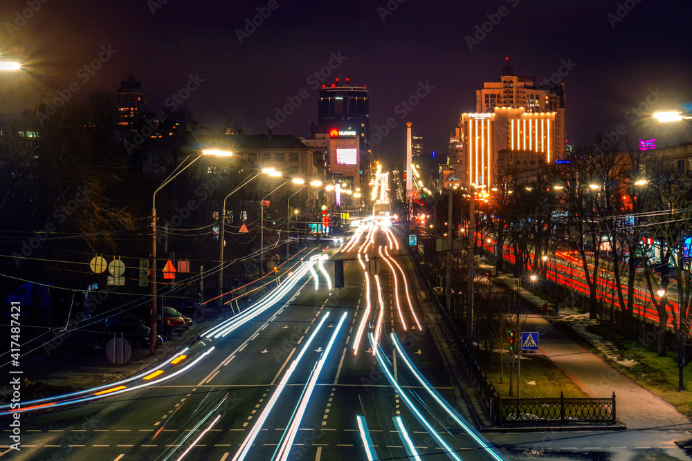 Obraz premium Kyiv, Ukraine long exposure view on trafic road at night city