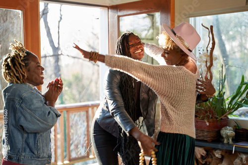 Friends gathering together for self care retreat at home
