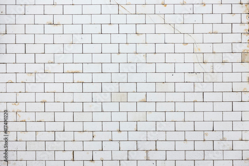background of white historic glazed tiles
