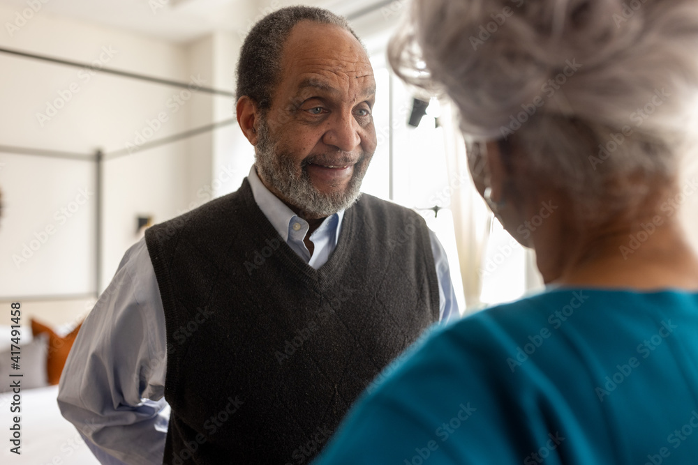 Senior man has surprise gift for wife, African American Senior man has surprise gift for wife, African American