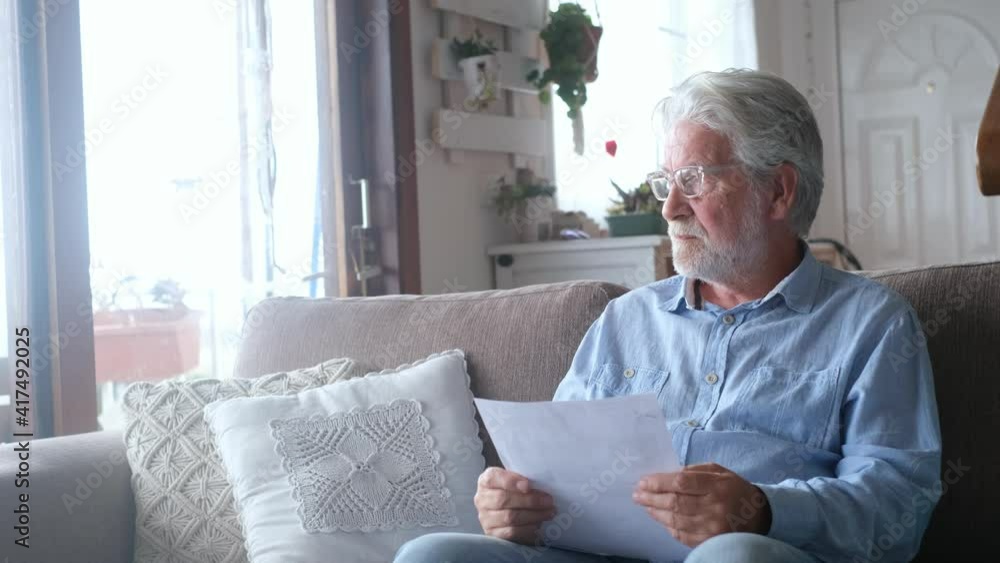Sad elderly man reading health insurance deal closing looking and reading the medical results. Sick mature senior hugging a sheet with the results or outcomes. Checking health tests
Sad elderly man reading health insurance deal closing looking and reading the medical results. Sick mature senior hugging a sheet with the results or outcomes. Checking health tests