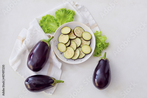 Εκτύπωση καμβά Bowl with chopped eggplant on light background