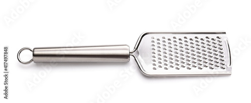 Metal grater on white background photo