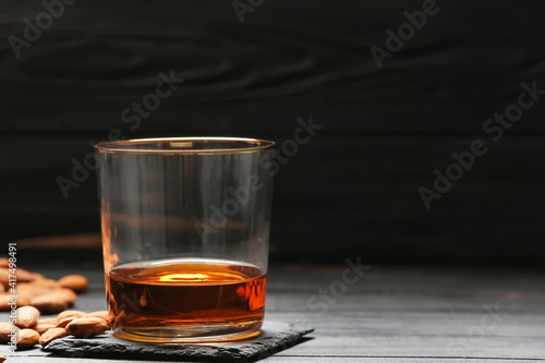 Golden rimmed glass of ambe...