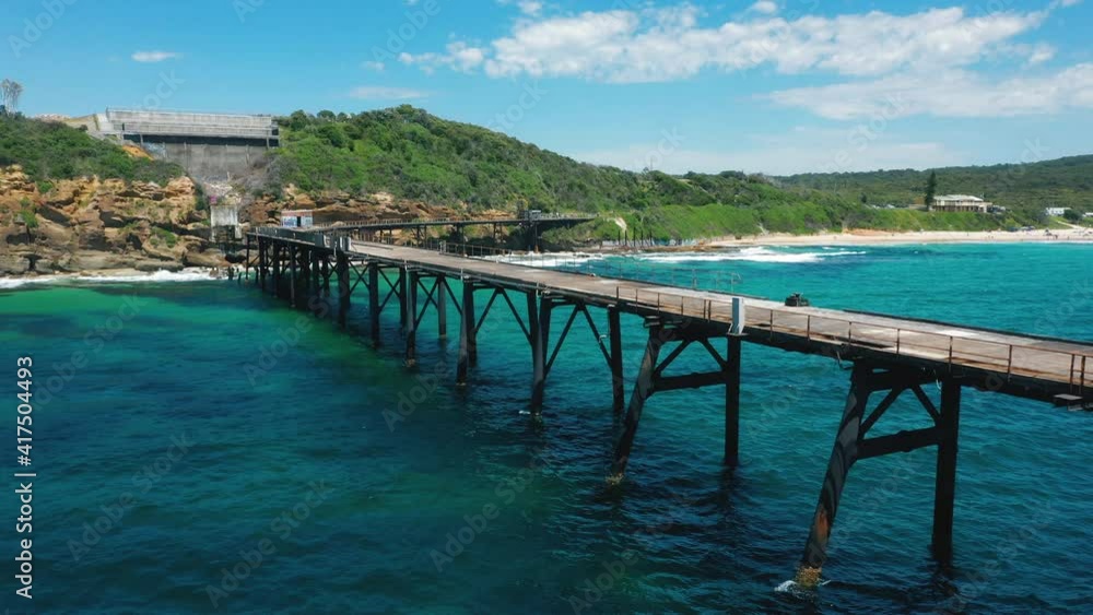 Disused coal loading pier on Catherine Hill Bay coast Australia, aerial view Disused coal loading pier on Catherine Hill Bay coast Australia, aerial view
