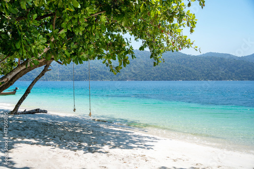 Atmosphere on the seaside that offers seats for tourists to watch the sea Andaman crystal sea white sand beach at Koh Lipe island in Satun, Thailand