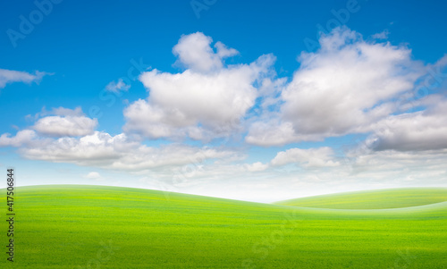 The white clouds have a strange shape and country side.Cloudy and blue sky.Cloud and mountains.Grass field and blue sky.Landscape of countryside.