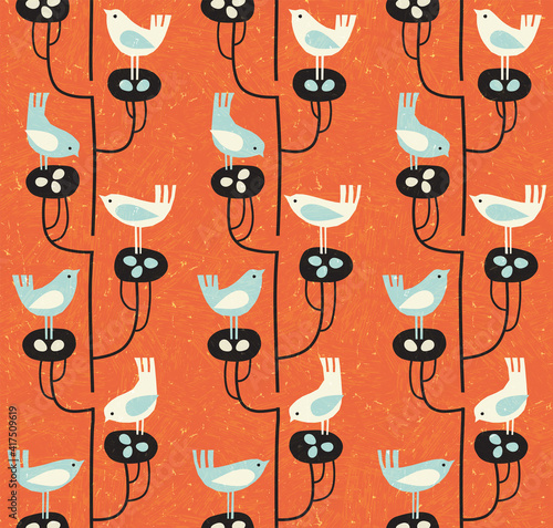 Cute mid-century style seamless  pattern with birds on nests with eggs. Fresh design for fabric, gift wrap, backgrounds and home decor.