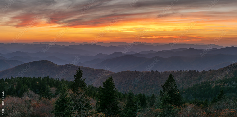 Colorful setting autumn sun on the southern stretch of  Blue Ridge Parkway - North Carolina   Cowee Mountain Overlook