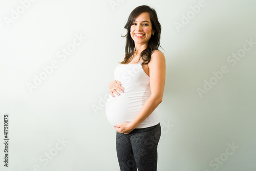 Portrait of an attractive expectant mother ready for exercising