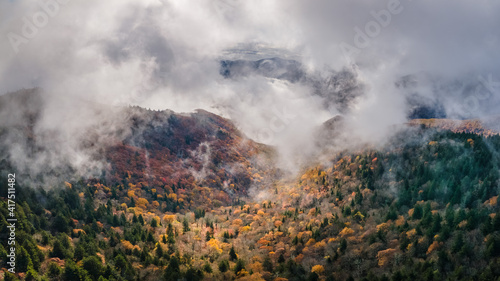 Dramatic autumn weather - with clouds, fog and sun - in the Blue Ridge Mountains