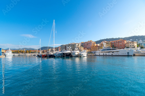 Luxury yachts and boats line the Port Lympia old harbor and marina of the Mediterranean city of Nice, France, along the French Riviera at summer. © Kirk Fisher
