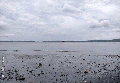 shallow black-sand beach 