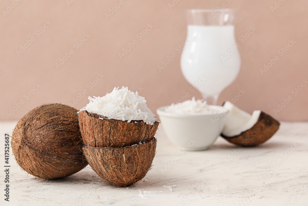Coconut with flakes on light table Coconut with flakes on light table
