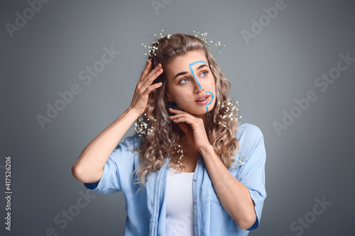 Beautiful young woman with ...