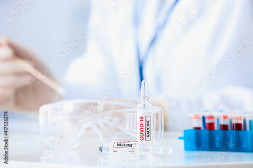 Covid-19 vaccine ampoules a...