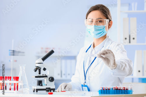 Scientist developing vaccine against COVID-19 in laboratory