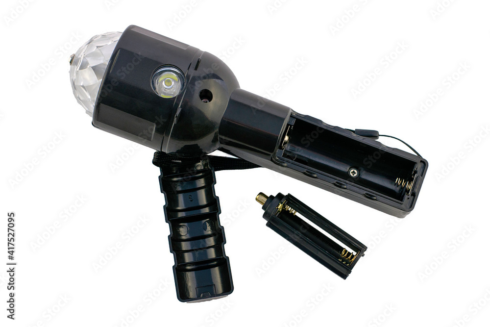 electric handheld flashlight with the lid open and the battery pack removed is isolated on a white background