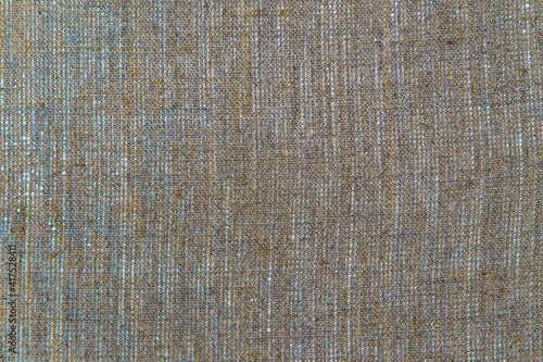 simple linen background: the reverse side of the primed canvas stretched over the frame, close, toning