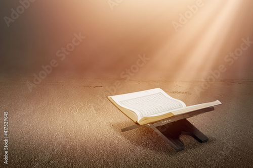Fototapeta Quran open in wooden placemat
