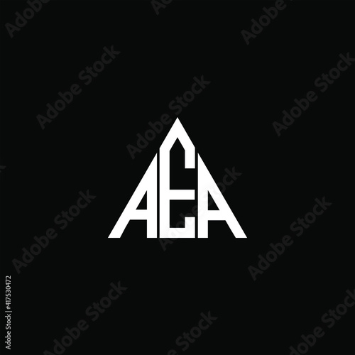 A E A letter logo abstract design on black color background. aea alphabet photo