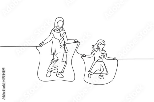 Single continuous line drawing of young Islamic mom and daughter play skipping rope together at park. Arabian muslim happy family motherhood concept. Trendy one line draw design vector illustration