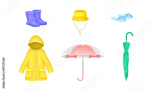 Waterproof Clothes and Things for Rainy Weather Condition with Yellow Raincoat and Umbrella Vector Set photo