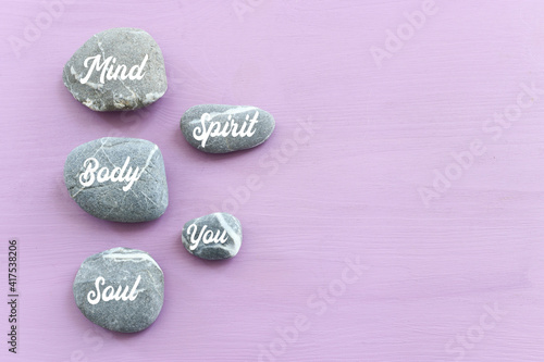 Canvas Print zen stones with the words Mind body soul