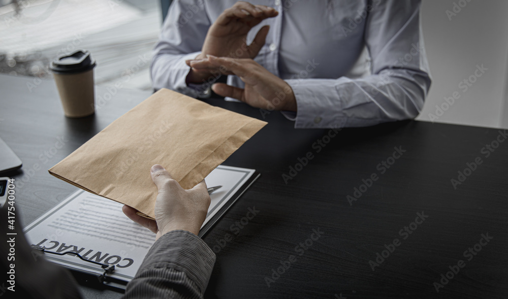 Businessmen refuse to accept money bribery or fraud or cheat, Combating Illegal Receiving of Money and Social Injustice, Anti bribery and corruption concept. Businessmen refuse to accept money bribery or fraud or cheat, Combating Illegal Receiving of Money and Social Injustice, Anti bribery and corruption concept.