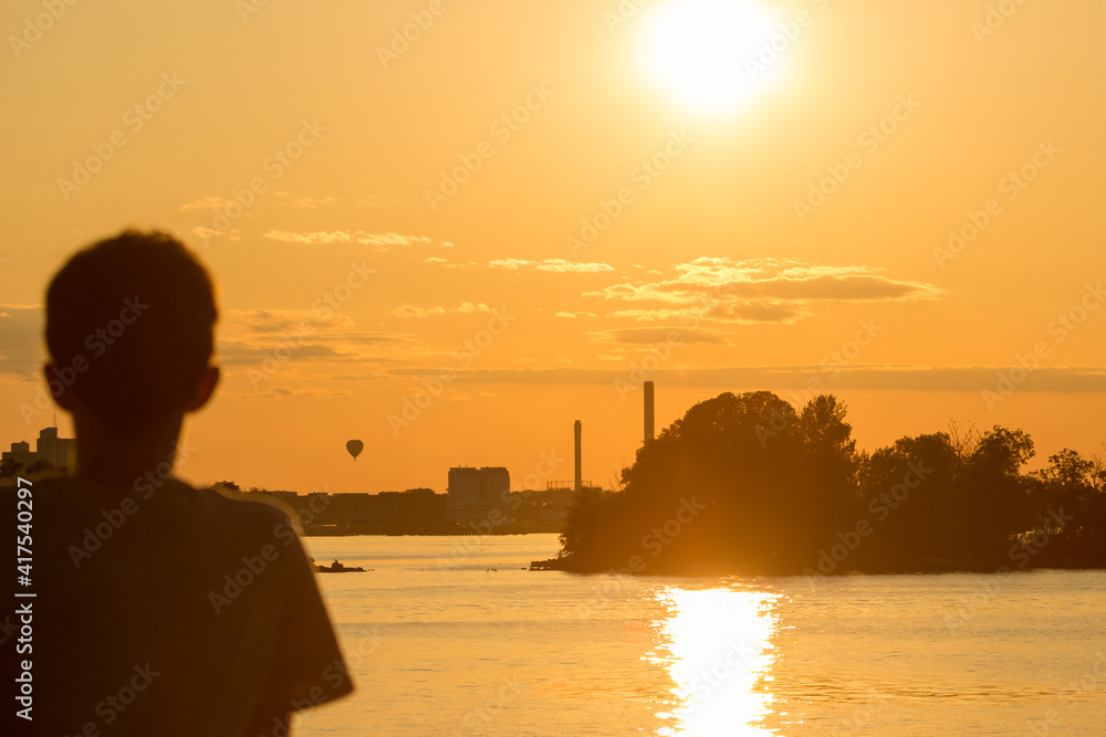 silhouette of a person on sunset