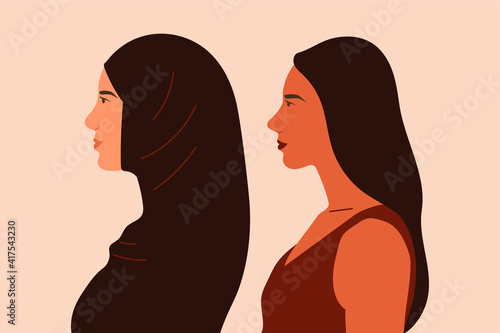 Two women from different countries and religions looked forward. Posters of women's unity and empowerment