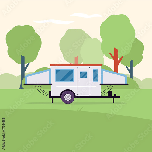 Trailer car in summer nature - vacation travel transport on camping site