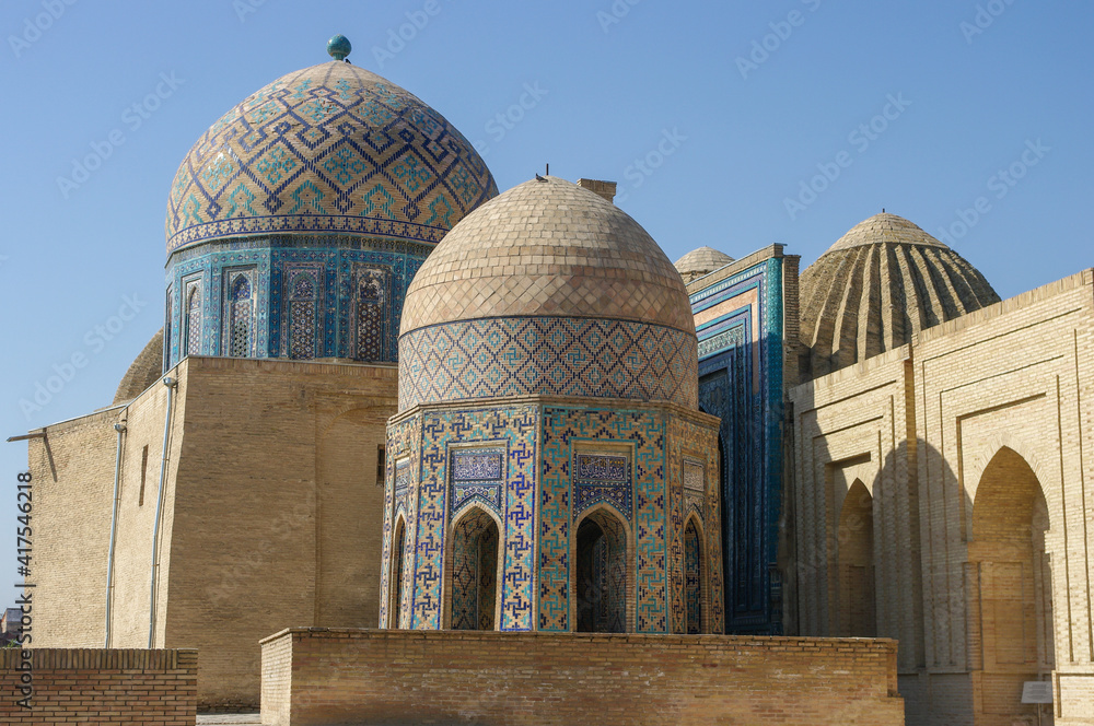 Landscape view of beautiful medieval mausoleums with blue tile mosaic decoration at Shah-i-Zinda necropolis in UNESCO listed Samarkand, Uzbekistan