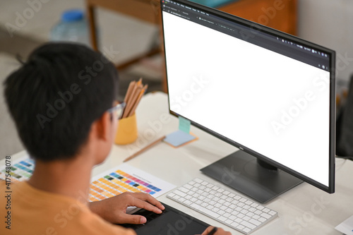 Graphic freelancer are working with digital board and mockup computer.