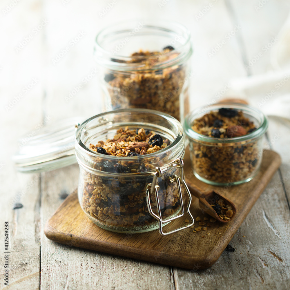 Traditional homemade granola in the jars Traditional homemade granola in the jars