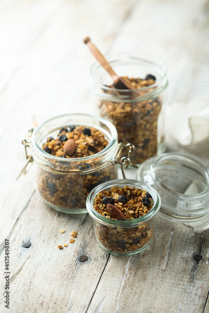 Traditional homemade granola in the jars Traditional homemade granola in the jars