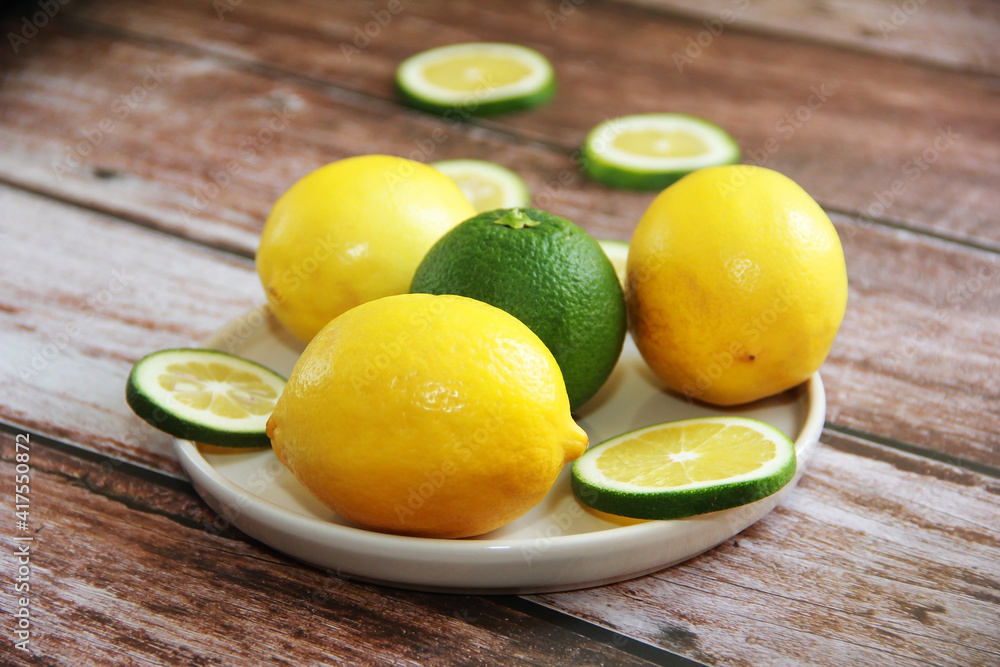natural yellow fruit lemon and round lemon slices