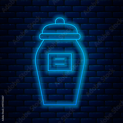 Glowing neon line Funeral urn icon isolated on brick wall background. Cremation and burial containers, columbarium vases, jars and pots with ashes. Vector.