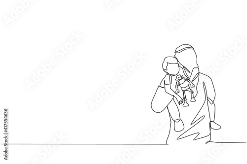 One single line drawing of young Arabian father hugging his boy son while holding robot toy vector illustration. Islamic Muslim happy family parenting concept. Modern continuous line draw design