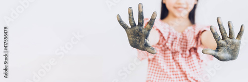 Photography Messy Painted children  two hands background. Banner frame.