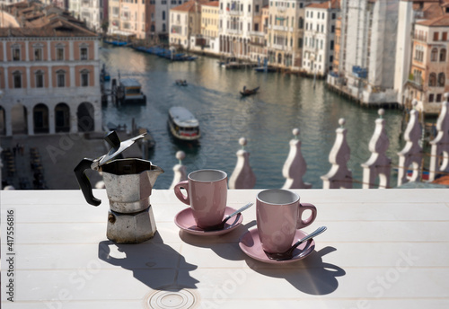 coffee for two facing the Grand Canal in Venice. Two cups and traditional Italian moka.