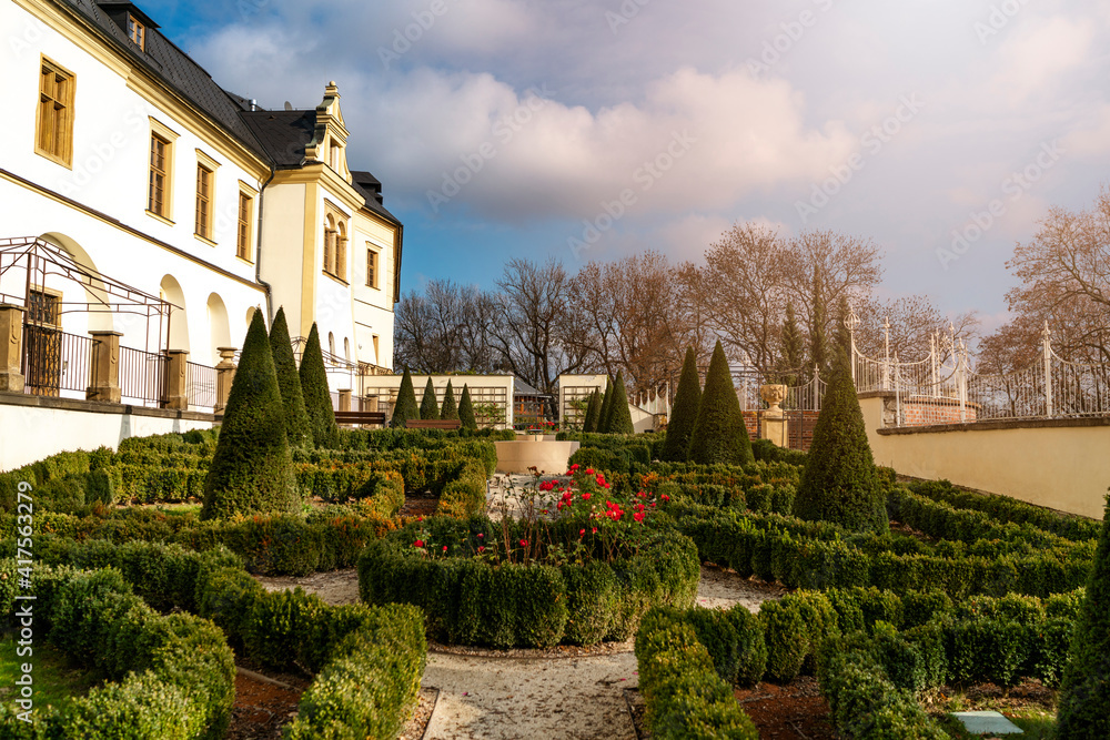 Gardens in Olomouc near baroque bulding