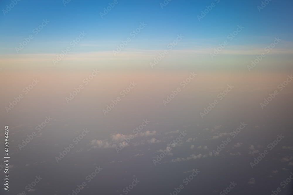 Beautiful blue sky with clouds shoot on airplane