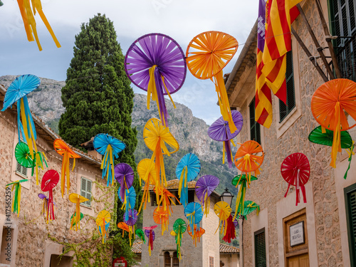 houses in the city of Deia at times of celebration are decorated in the streets with colorful art made by the villagers, majorca, spain