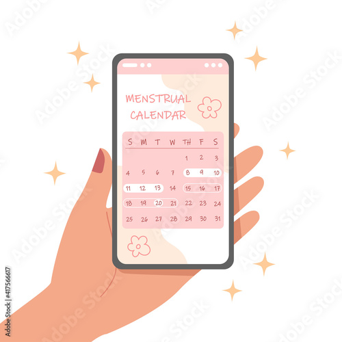 Smartphone with menstrual cycle calendar on screen