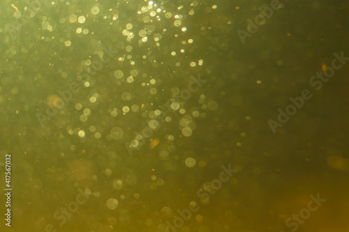 Abstract glitter gold bokeh