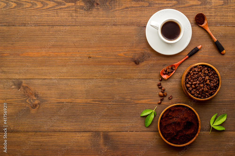 Coffee background. Coffee beans and hot drink, top view Coffee background. Coffee beans and hot drink, top view